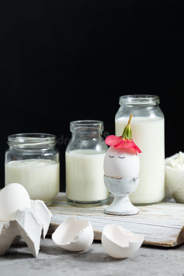 Fresh Dairy and Fermented Milk Products. Eggs on a White Background