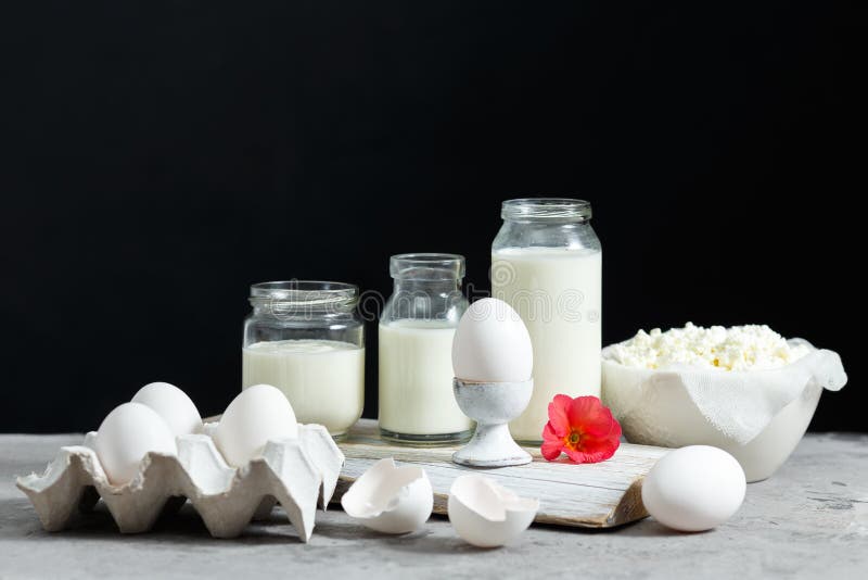 Fresh Dairy and Fermented Milk Products. Eggs on a Black Background Stock Photo Image of