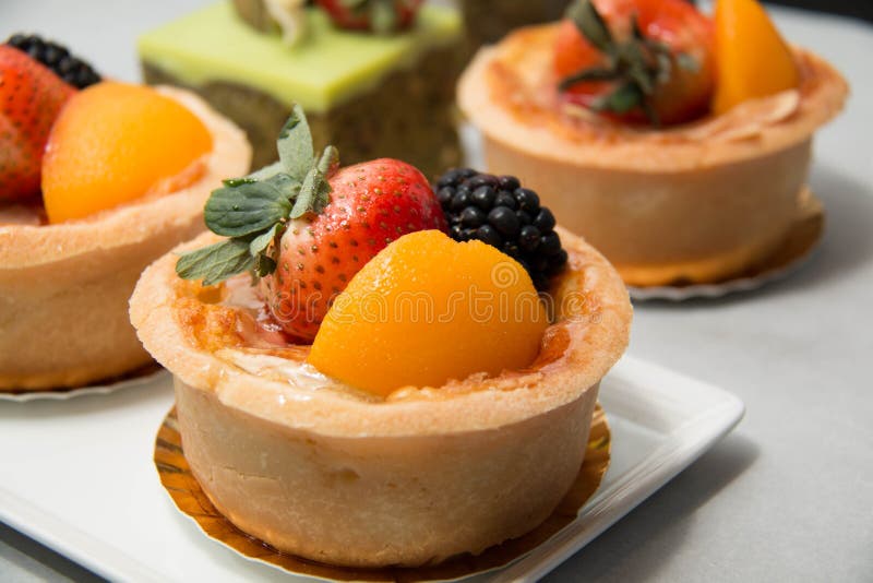 Fresh dessert fruit tart in assorted tropical fruits