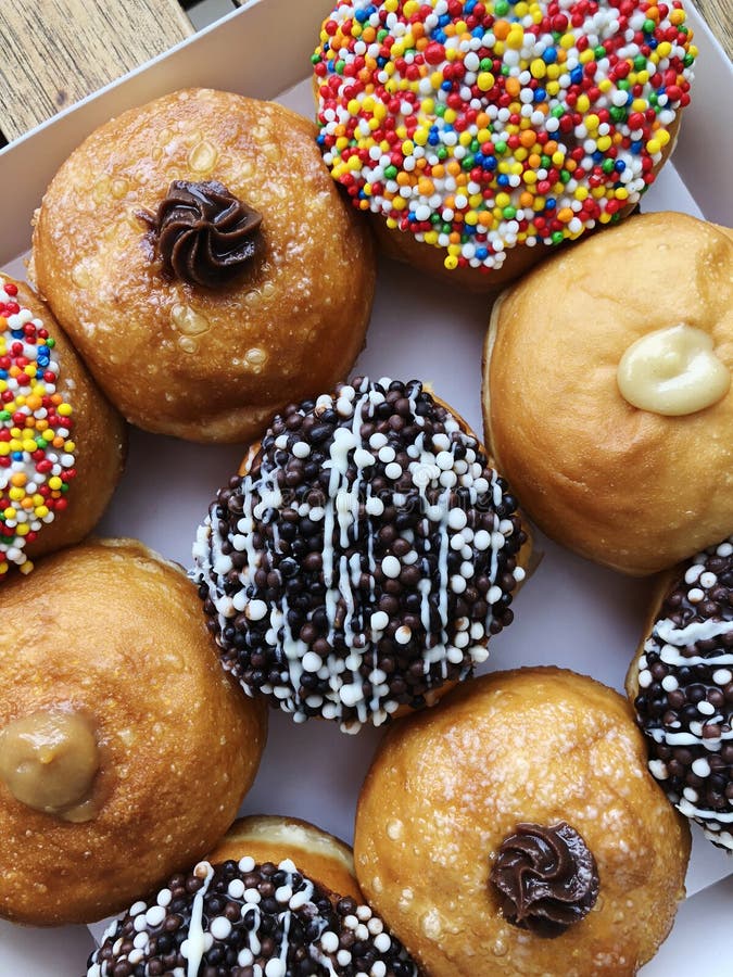 Fresh Donuts On Bakery Display For Hanukkah Celebration. Stock Photo Image of chanukah