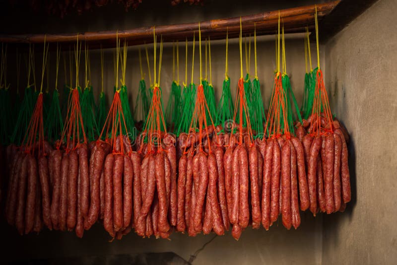 Fresh and Dried Chinese Sausages Hang from Racks Stock Photo Image of