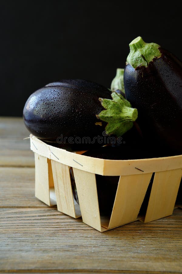 Fresh eggplant in a box stock images
