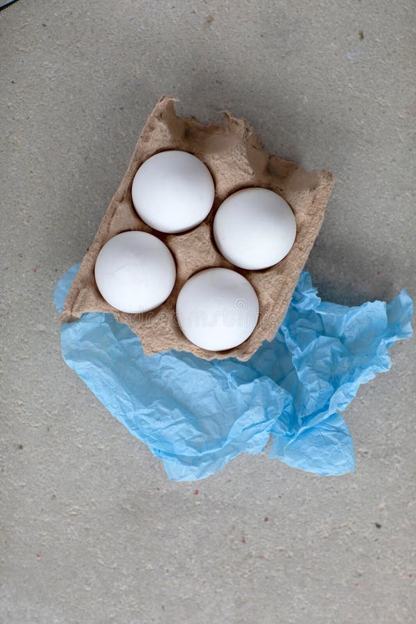 Fresh Eggs in Egg Carton stock photo. Image of minimalist 270581806