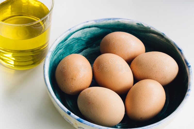 Fresh eggs an virgin olive oil stock photos Fresh eggs an virgin olive oil stock photos