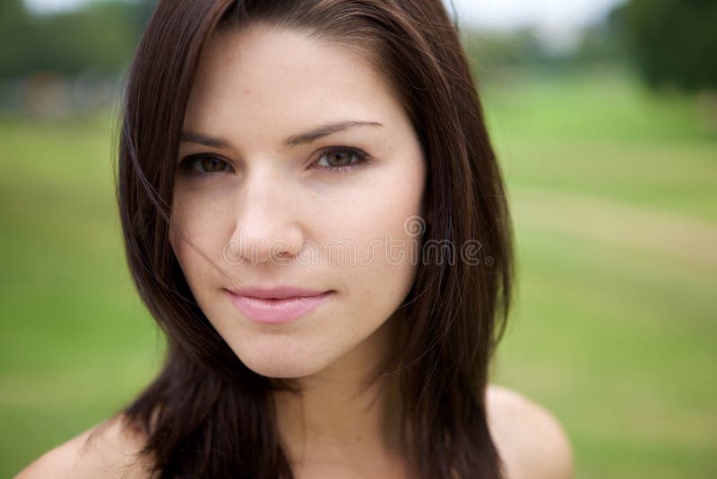 Fresh Faced Girl With Green Background