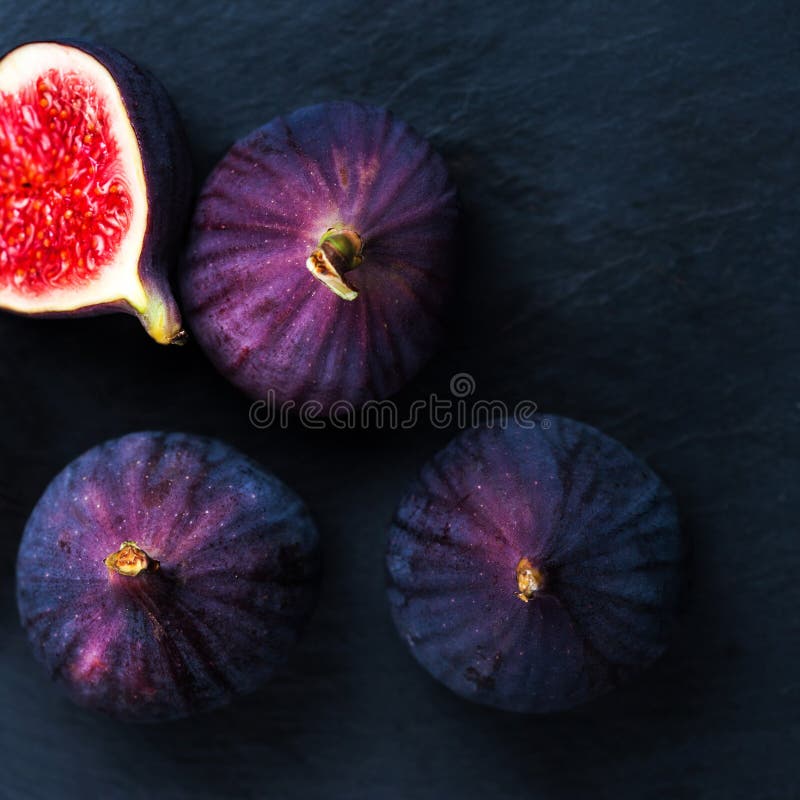 Fresh Figs on Black Background. Beautiful Blue Violet Figs with Stock ...