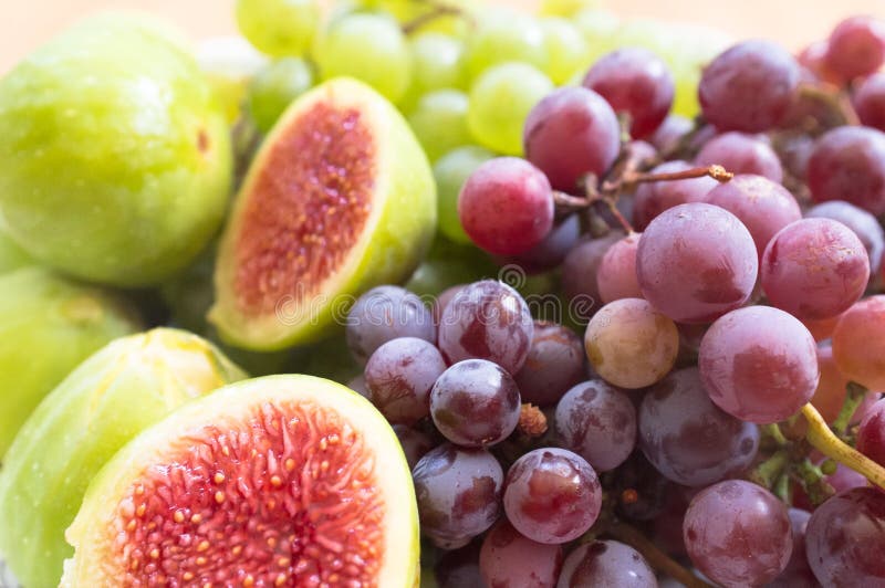 Fresh figs and grape royalty free stock photo