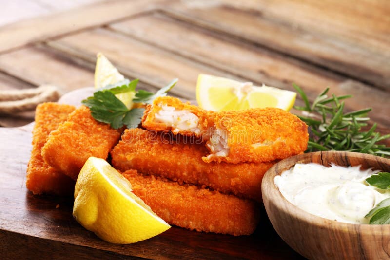 Fresh Fish Fingers with Remoulade Sauce. Breaded Fish Fingers with