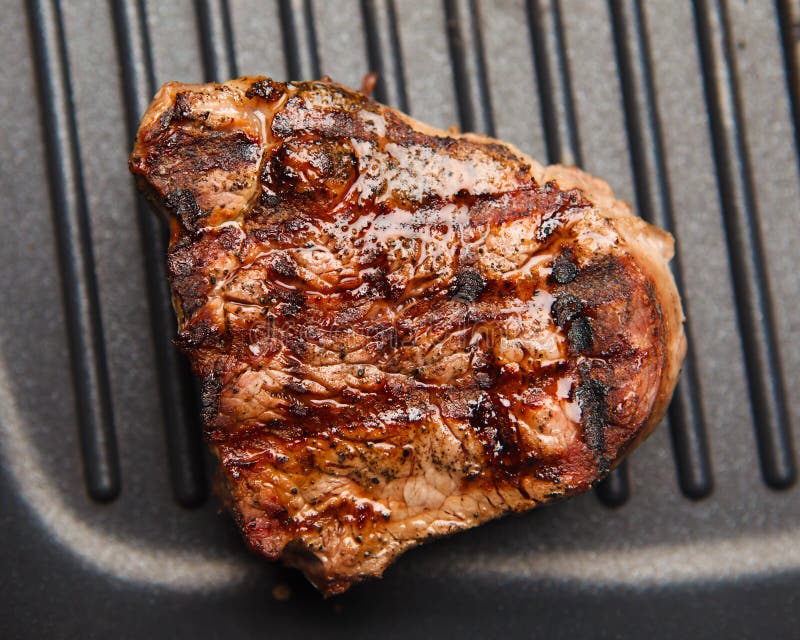 Fresh Fried Steak on a Grill Pan Stock Image Image of metal, dishware 47531021
