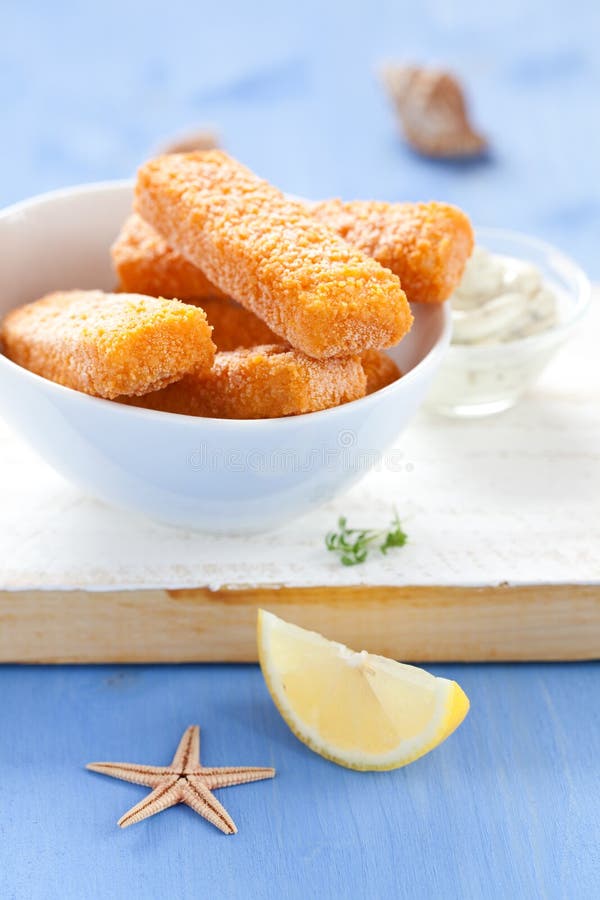 Fresh frozen fish fingers royalty free stock photography