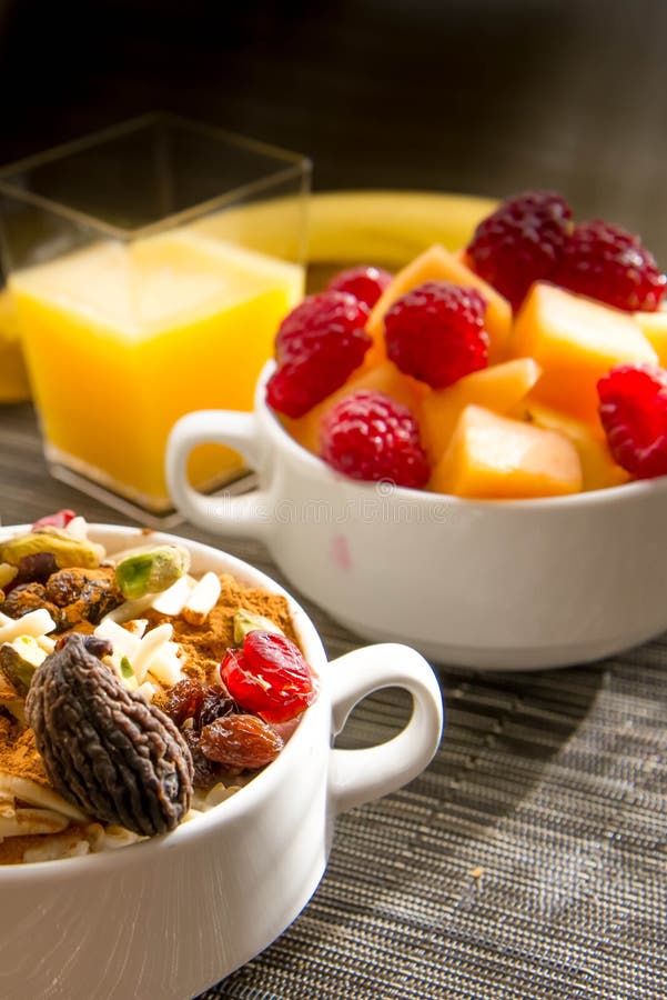 Fresh Fruit and Oatmeal with Healthy Toppings for Breakfast Stock Photo Image of cranberries