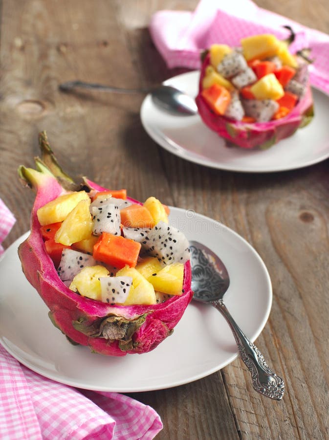 Fresh fruit salad in dragon fruit skin royalty free stock photos Fresh fruit salad in dragon fruit skin royalty free stock photos