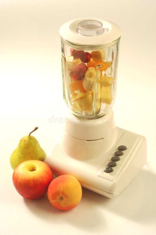 Fresh Fruit and Vegetables Smoothie Blended in Blender, Stock Image