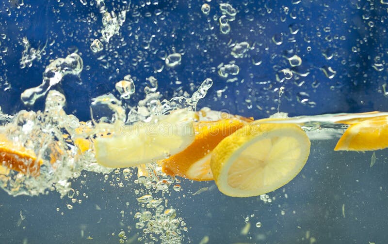 Fresh fruit in water stock photo. Image of orange, flow 13078022