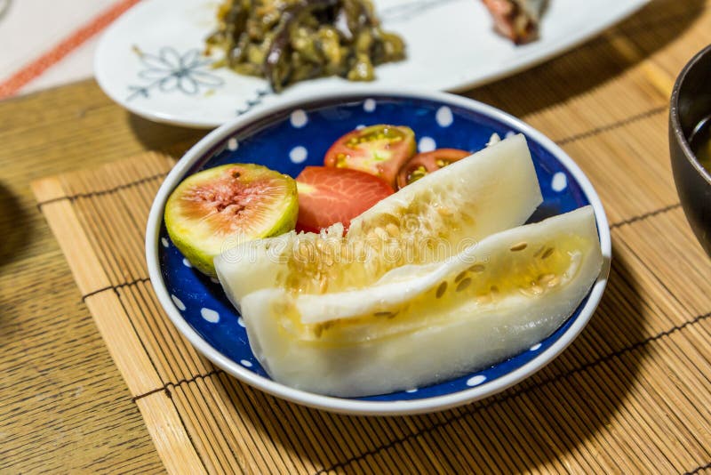 Fresh Fruits after Breakfast Honeydew Melon, Fig and Tomato. Stock