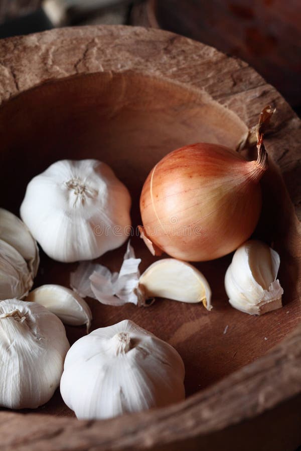 Fresh garlic cloves and onion