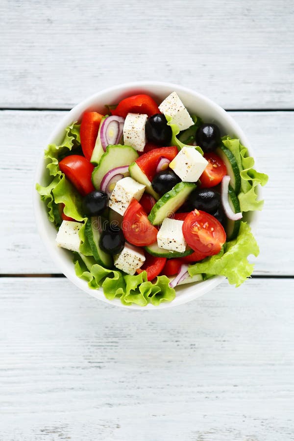 Fresh greek salad top view in white bowl royalty free stock images Fresh greek salad top view in white bowl royalty free stock images