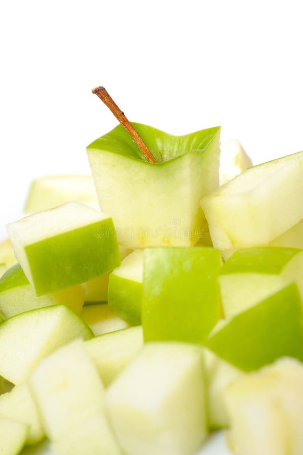 Fresh green apple cut into slices.