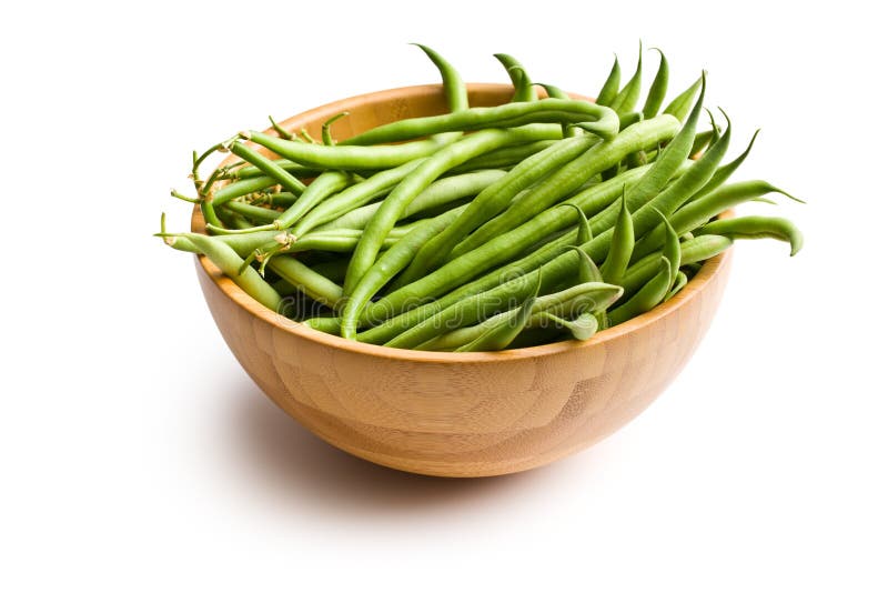 The fresh green beans in wooden bowl