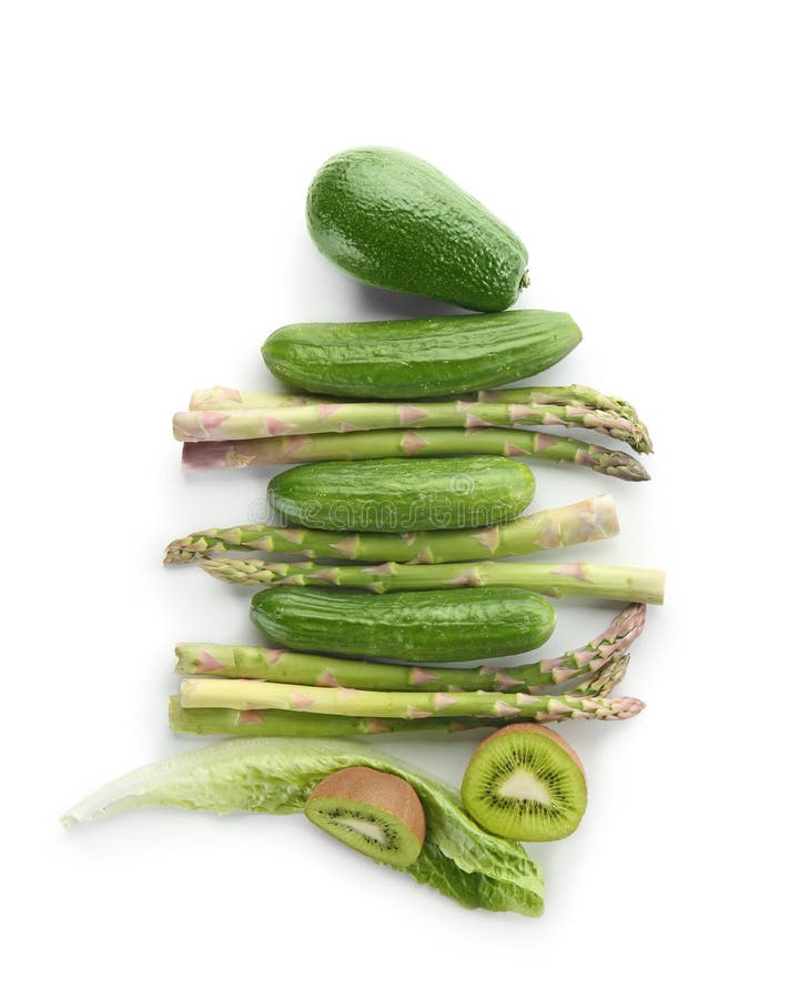 Fresh green fruits and vegetables on white background, top view. Healthy food concept royalty free stock photos Fresh green fruits and vegetables on white background, top view. Healthy food concept royalty free stock photos