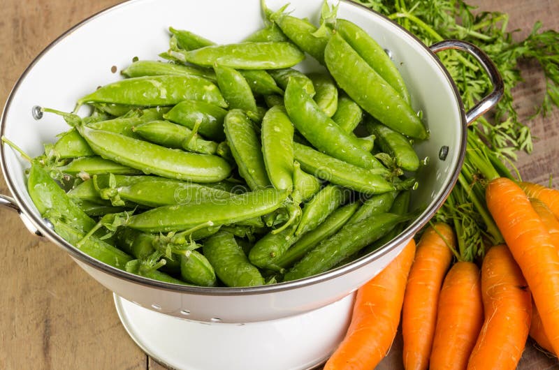 Fresh Green Peas and Carrots Stock Image Image of orange, natural