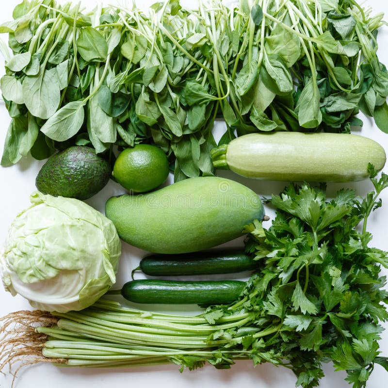 Fresh Green Vegetables Variety on Rustic White Background from Overhead