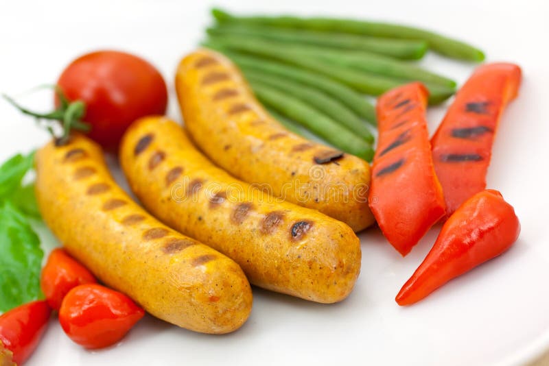 Fresh grilled sausages with red bell pepper