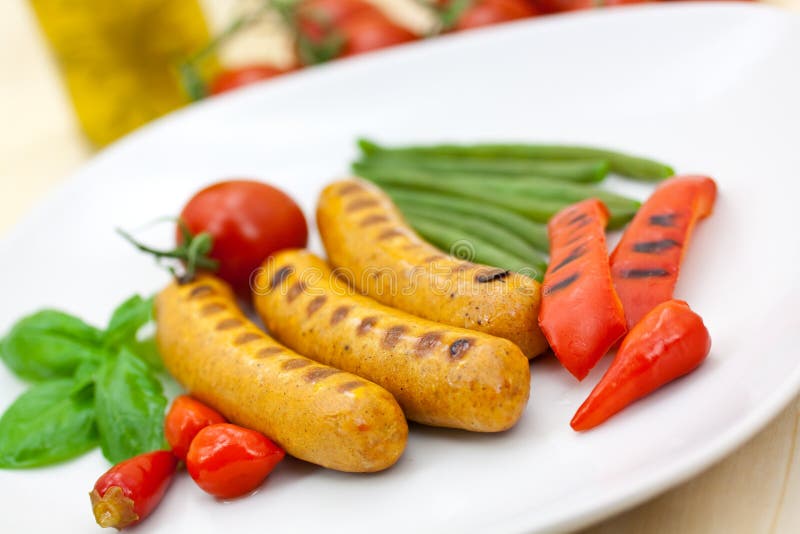 Fresh grilled sausages with red bell pepper