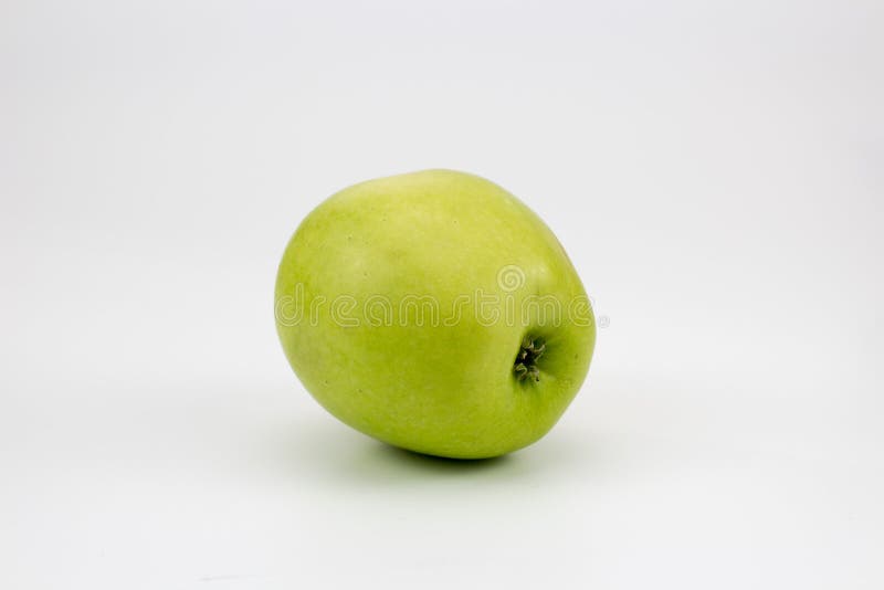 Fresh healthy green apple on the table royalty free stock photo