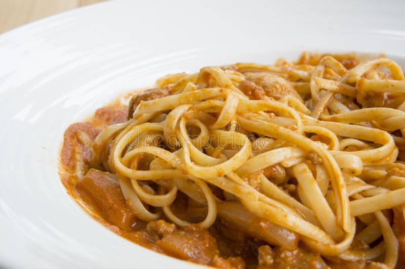 Fresh homecook spaghett on wooden table. Italian pasta spaghett stock images, royalty-free photos and pictures