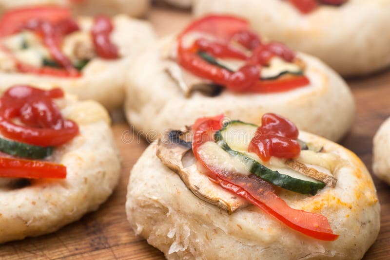 Fresh homemade mini pizzas stock photo. Image of herbs - 98175398