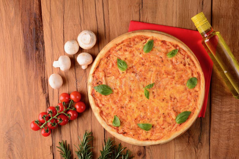 Fresh ingredients around pizza and napkin royalty free stock image Fresh ingredients around pizza and napkin royalty free stock image