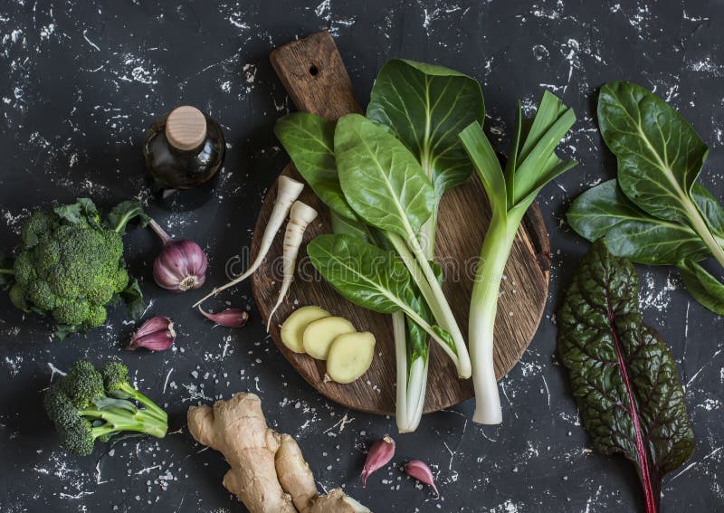 Fresh ingredients - chard, leeks, ginger, broccoli, garlic, soy sauce. royalty free stock photography Fresh ingredients - chard, leeks, ginger, broccoli, garlic, soy sauce. royalty free stock photography