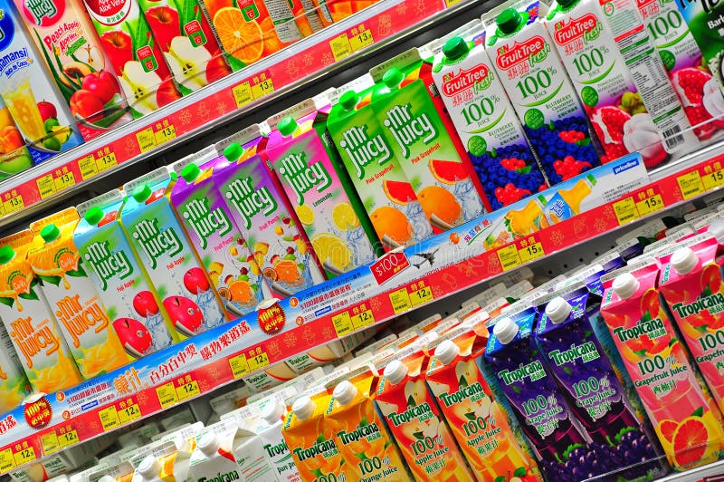 Fresh juice at supermarket editorial photography. Image of liquid