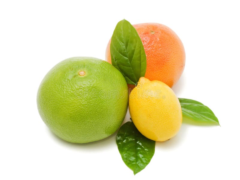 Fresh juicy grapefruits with green leafs