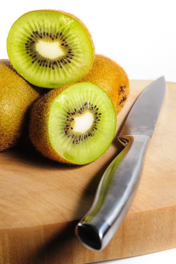Fresh Kiwi Fruit on Chopping Board with a Knife Stock Photo Image of