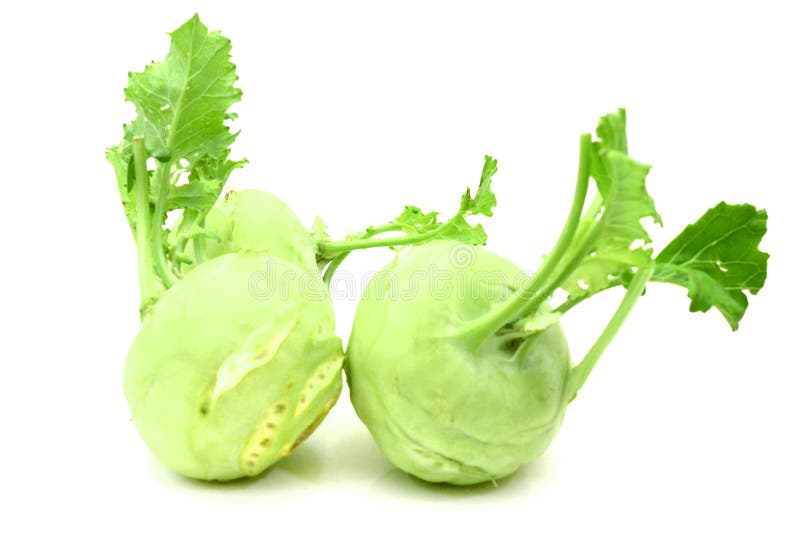 Fresh Kohlrabi with Green Leaves on Isolated White Backround. Stock