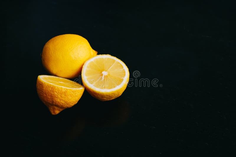 Fresh Lemon on Black Background. Two Lemons. Stock Photo Image of