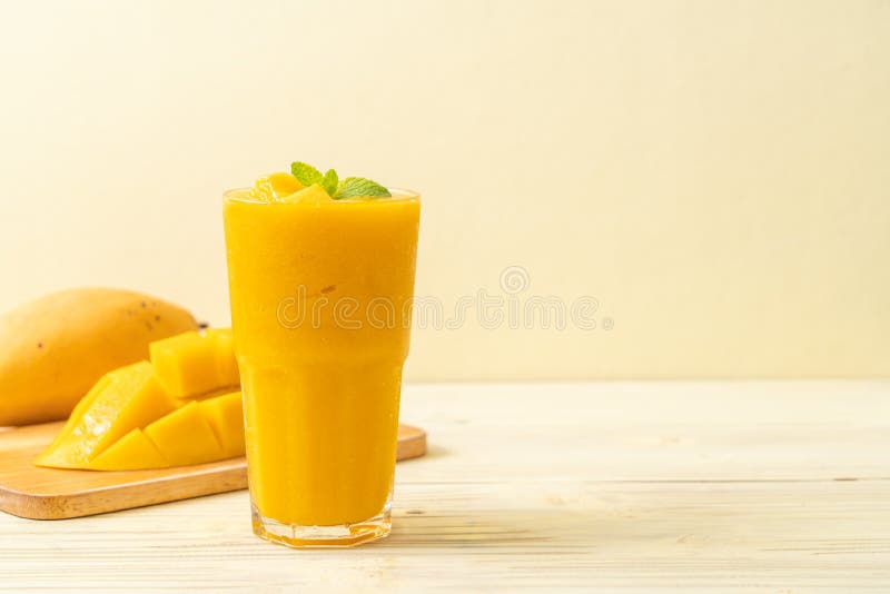 Fresh mango smoothies stock photo. Image of organic 140454444