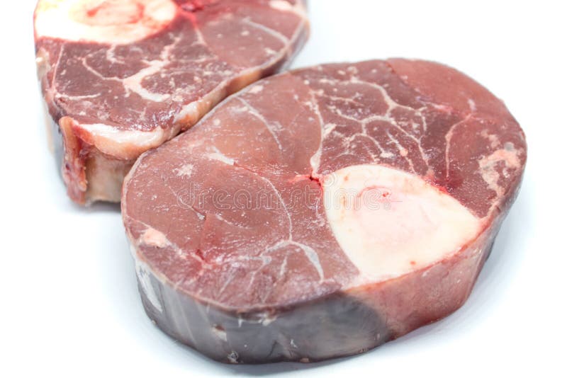 Fresh Meat of a Leg of Beef on a White Background. Stock Image Image