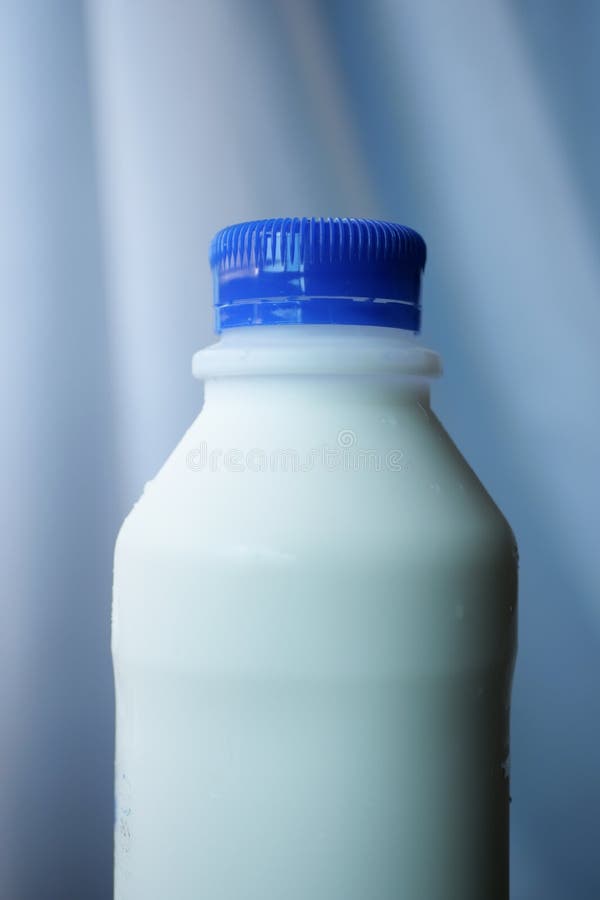 Fresh Milk in a Plastic Container on Table Stock Photo Image of