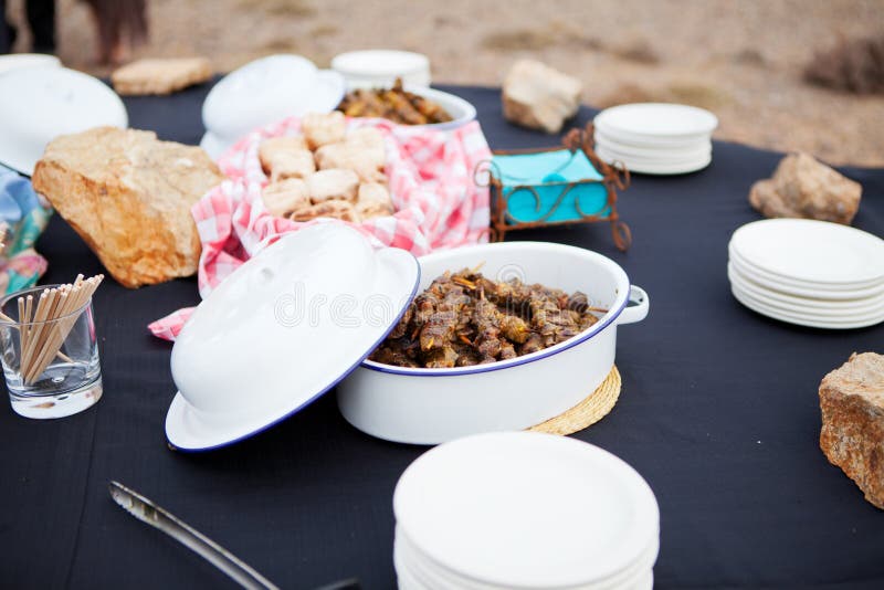 Fresh mutton meat kebabs and roasted bread served in dishes