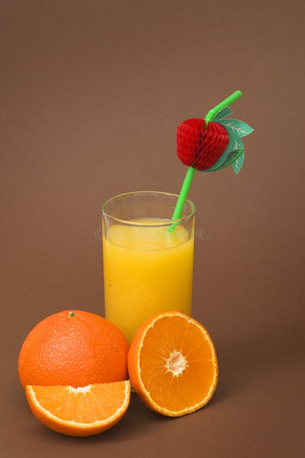 Fresh natural orange juice and orange fruits royalty free stock photography