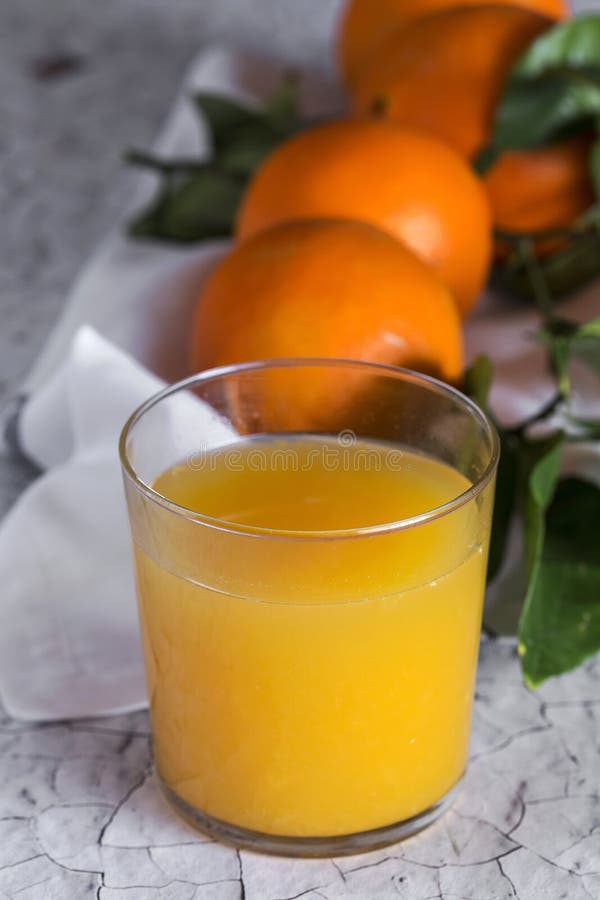 Fresh Orange Juice in Glass Cup Stock Photo Image of vegan, leaves