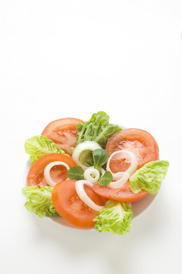 Fresh natural salad bowl tomato lettuce onion