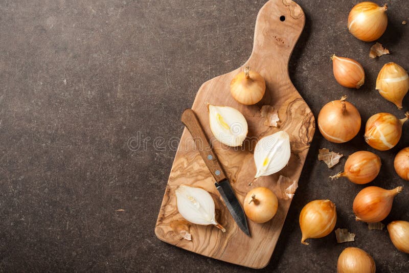 Fresh Onion on Kitchen Table Stock Image - Image of root, wooden: 110323403