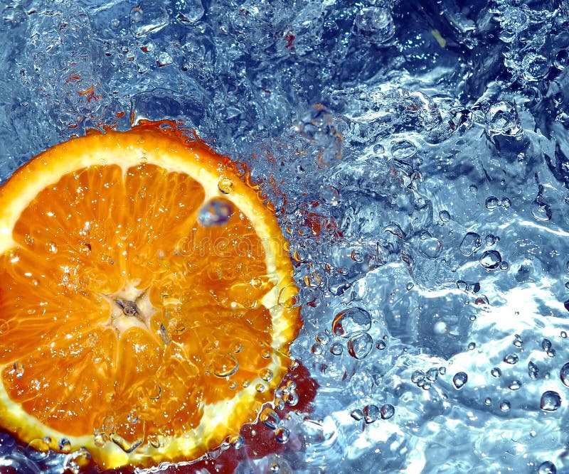 Fresh orange in cold water stock photo. Image of soda, pour 658246