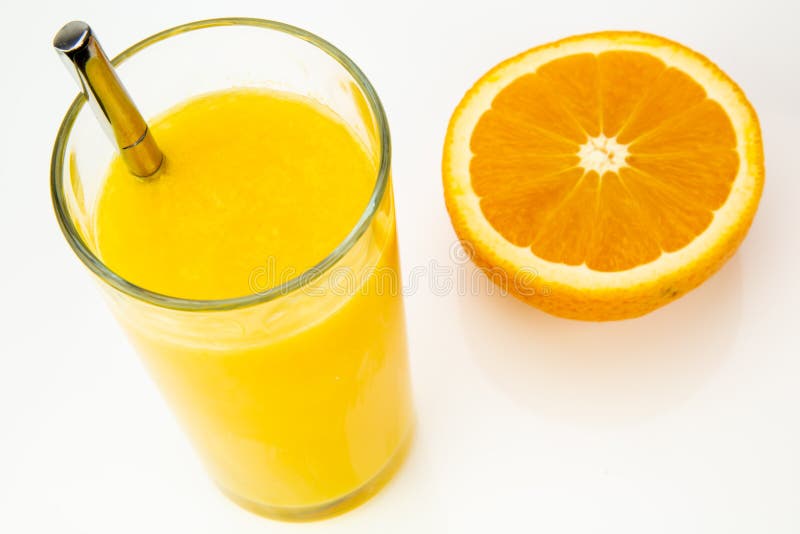 Fresh Orange Juice and Half Orange on White Background Stock Photo