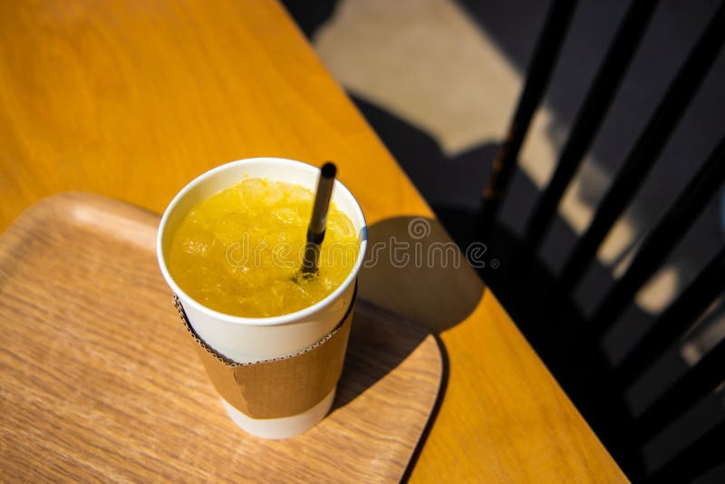 Fresh Orange Juice at a Paper Glass with Black Straw Stock Image Image of cafeteria, closeup
