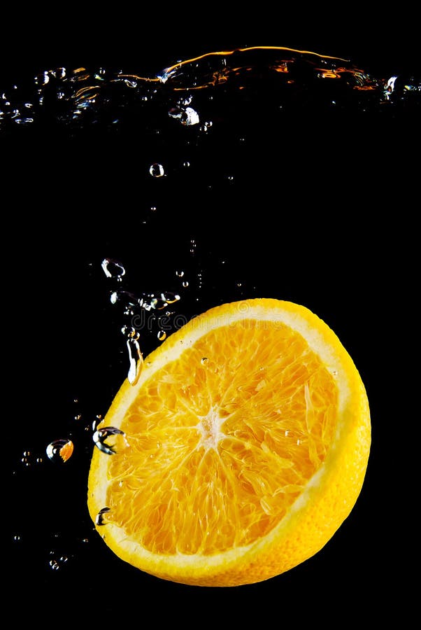 Fresh orange in the water stock image. Image of health 10715833